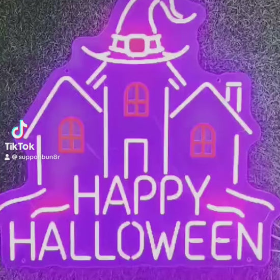 haunted house neon sign