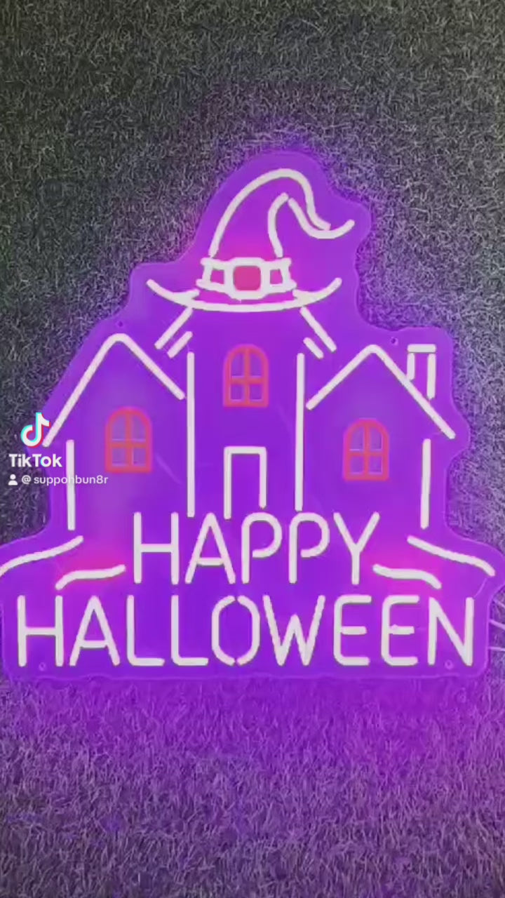 haunted house neon sign